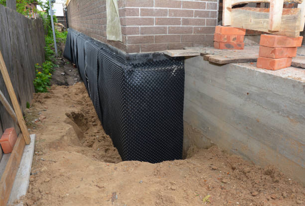 Happy homeowners after waterproofing job in Unionville